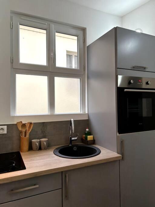 Le Petit Paris Compiegne Apartment ภายนอก รูปภาพ